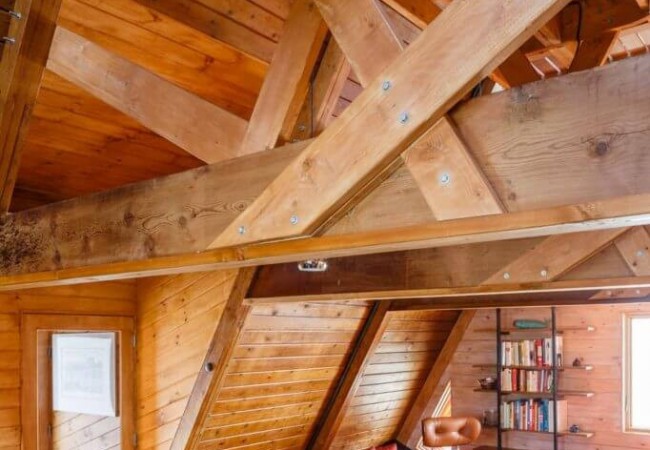 A-Frame-House-in-The-Hamptons-Revamped-by-Edgar-Papazian-triangle-house-6-683x1024